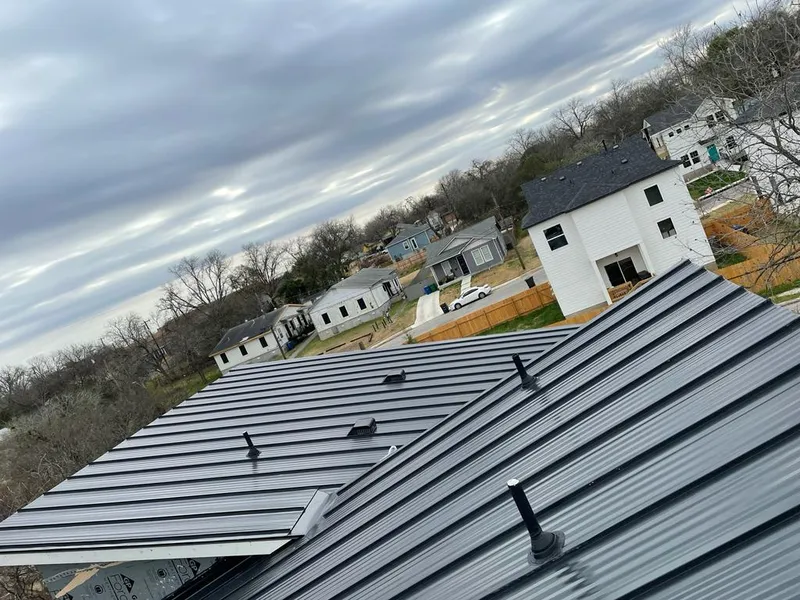 Standing seam metal roof panels with vents for Skylight Repair in Baltimore